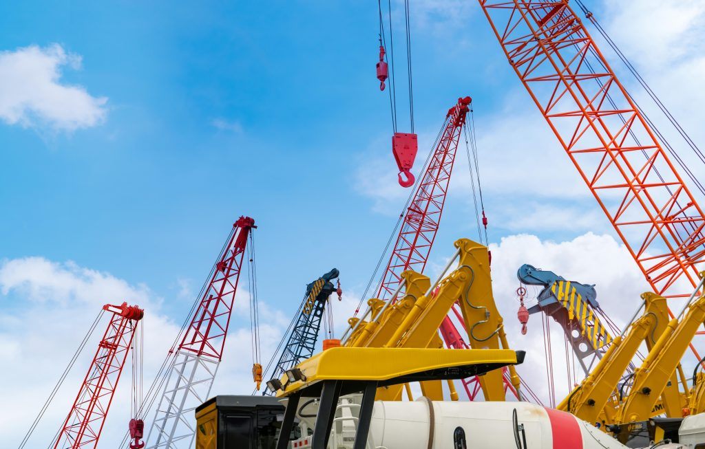 Crawler crane against blue sky